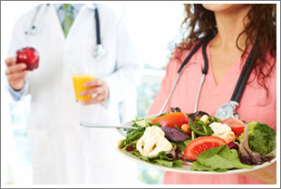 Dietetic Technician showing healthy salad